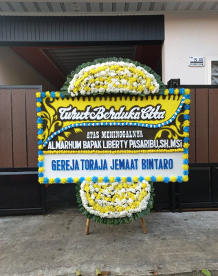 Papan Bunga Duka di Sukanaeyo